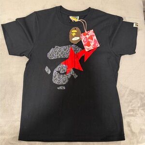 Black T-Shirt with Red and Purple Graphic